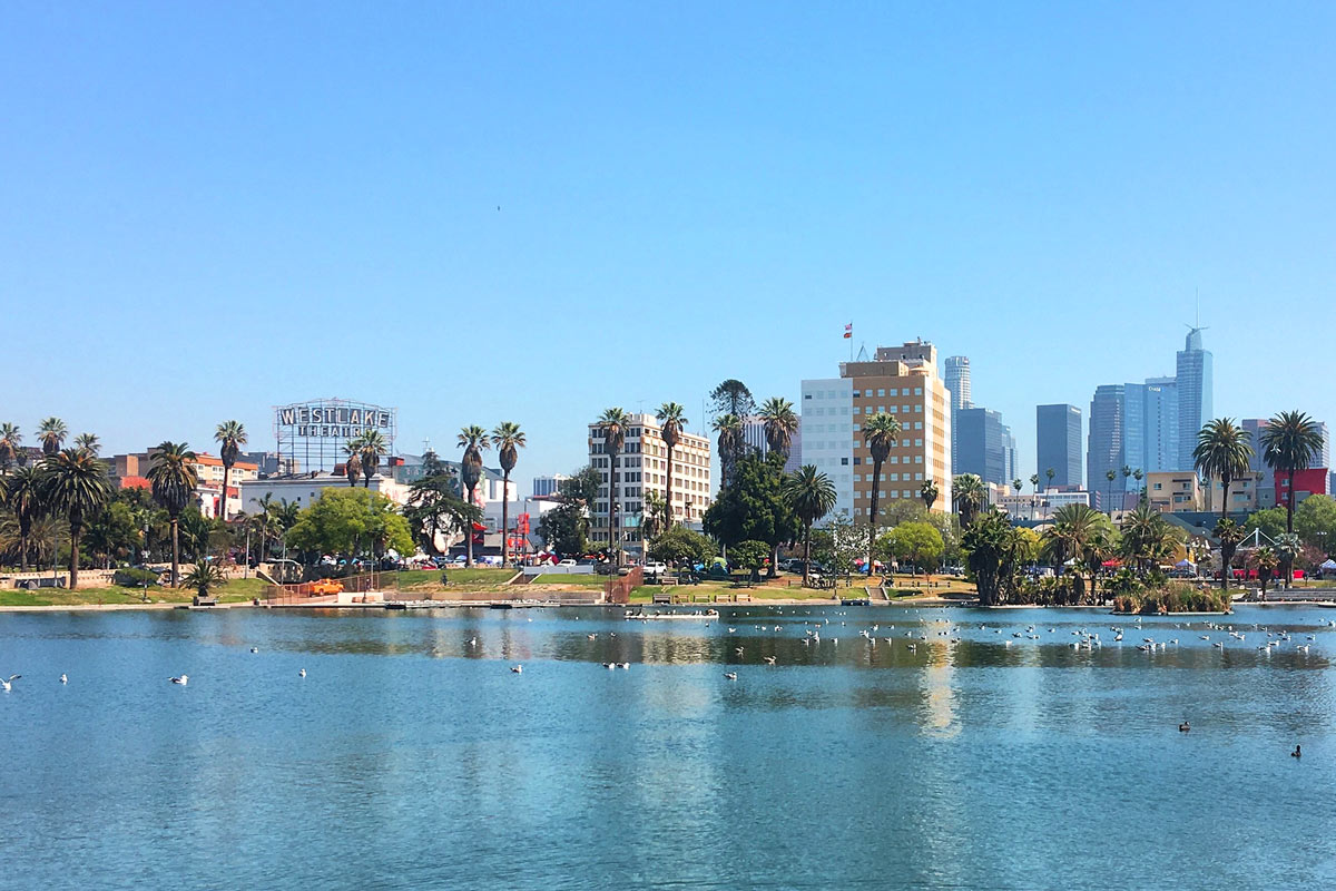 The Los Angeles Skyline wonderfully frames MacArthur Park (formerly Westlake Park) along Angels Walk Wilshire Boulevard.